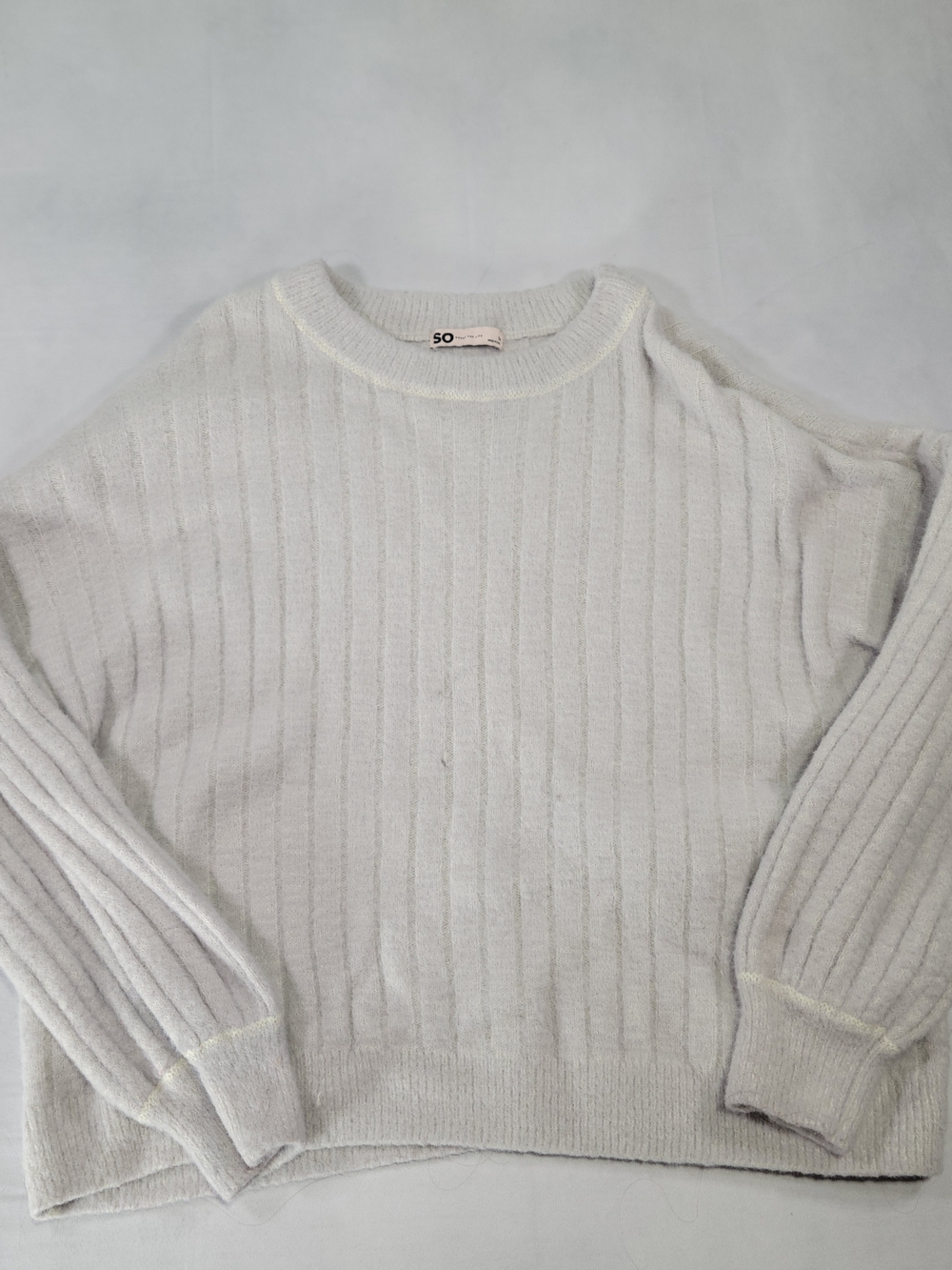 SO Ribbed Crewneck Sweater in Light Cream - Small Hole In Front